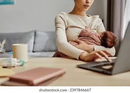 mom doing online therapy in new york while holding baby