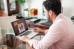 man doing online therapy from home | NY | SC