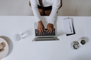 woman on computer for a virtual emdr session